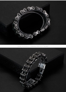 Detail of vintage industrial steel bike chain bracelet with distressed metal finish