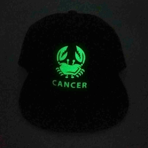 Luminous Cancer zodiac glowing effect on a black hip hop flat brim baseball cap
