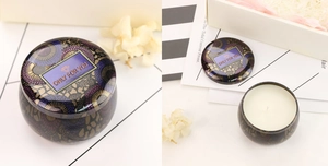 Detail of purple floral tin candle with Only For You text and white soy wax interior