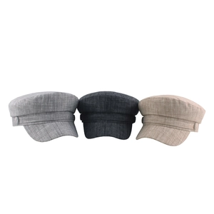 Set of three retro cotton linen newsboy caps in light grey, dark grey and beige colors