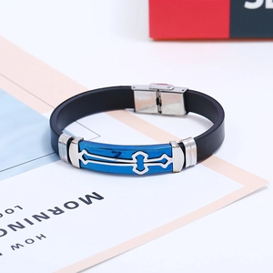 Detail of cross pattern on blue metal plate of men's silicone stainless steel bracelet