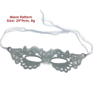 Silver wavy lace masquerade mask detail showing 29x9cm dimensions and ribbon tie