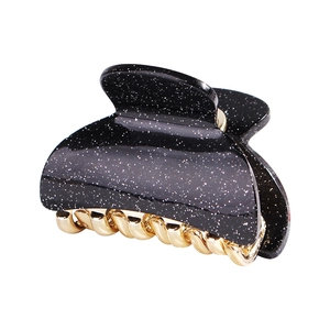 Sparkling black acrylic claw clip with silver glitter finish and golden metal teeth