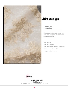 Detail of bridal gown lace skirt with vintage floral champagne embroidery and fine stitching