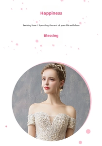 Close-up of off-white wedding gown featuring intricate pearl beadwork on the neckline