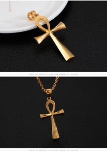 Detailed view of polished gold Ankh cross pendant with stylish twisted rope chain necklace