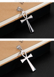 Close-up of polished silver Ankh cross pendant made of stainless steel for men