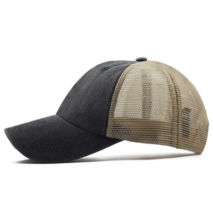 Vintage washed cotton trucker hat in dark grey with khaki mesh back and curved brim