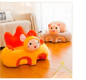 Detail view of plush baby support sofa in cute yellow chick and brown pig animal shapes