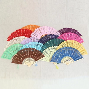 Assorted colors of handmade lace folding fans with vintage bamboo ribs and tassels