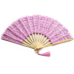 Detail of pink lace folding fan with intricate embroidery and bamboo ribs with tassel
