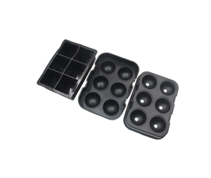 Detail of black food-grade silicone ice mold set including square and spherical trays
