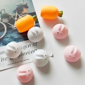 Collection of cute silicone pig and bunny squeeze toys with carrot figures for stress relief