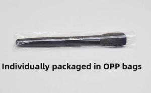 Detailed view of single loose powder brush packed in a transparent protective OPP bag