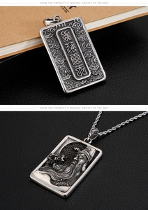 Detailed views of vintage Guan Gong pendant with traditional Chinese relief on silver chain