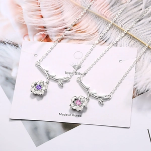 Elegant floral pendant necklaces with purple and pink crystals on silver chain