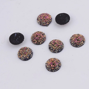 Macro view of 14mm round colorful resin druzy cabochons with sparkling texture and flat back