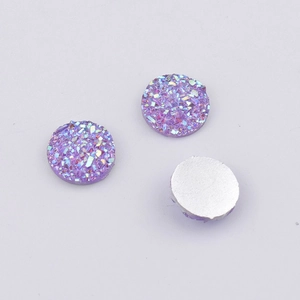 Macro shot of 10mm purple glitter druzy resin cabochons with flat silver back for DIY