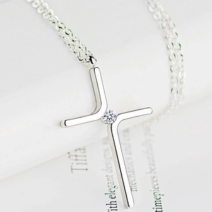 Minimalist silver cross pendant necklace with centered round crystal and O-chain for women