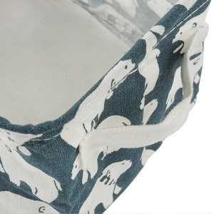 Blue canvas storage basket with white polar bear print and sturdy side handles