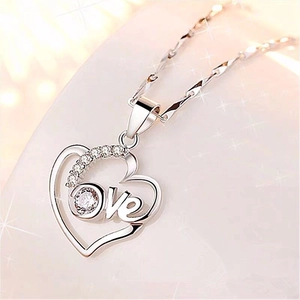 Elegant silver heart necklace with Love engraving and sparkling diamond accents