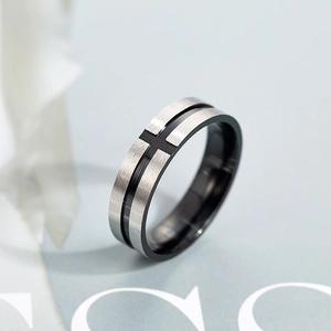 Retro stainless steel ring with blue accents and cross pattern in brushed metal finish