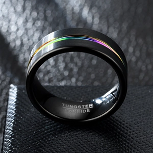8mm black brushed tungsten carbide ring with rainbow inlay on black leather background