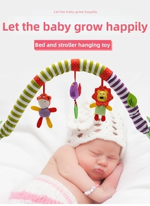 Infant stroller arch with plush hanging bird and lion toys and a green teether toy
