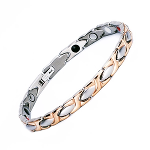 Polished stainless steel magnetic therapy bracelet in silver and rose gold finish