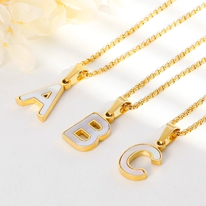 Elegant gold-plated stainless steel necklaces with shell alphabet pendants A, B, and C
