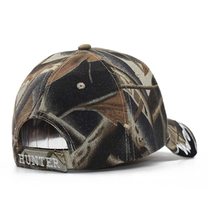 Detail of camouflage baseball cap showing adjustable strap with HUNTER embroidery