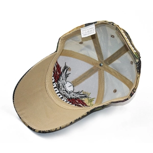 Detail of baseball cap interior showing eagle embroidery and 100% acrylic care label