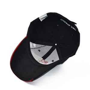 Detail view of the baseball cap's inner lining, sweatband, and 100% acrylic care label