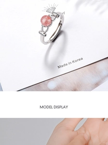Detailed close-up of S925 sterling silver adjustable ring with pink strawberry quartz