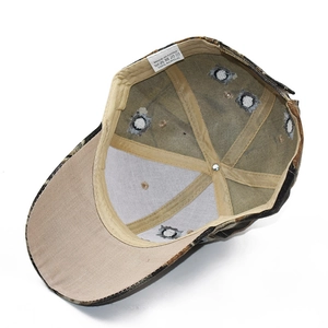 Interior view of camouflage baseball cap showing acrylic fabric and quality stitching