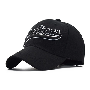 Detailed close-up of 3D Las Vegas embroidery on a premium black cotton baseball cap