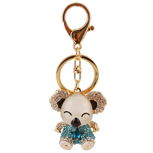 Cute koala keychain with blue rhinestones and gold-plated metal pendant on white background