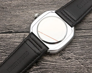 Detail of genuine leather strap and stainless steel back case on a punk square watch