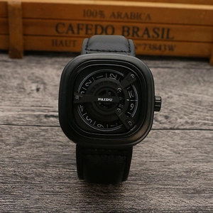 Detail of the unique square rotating dial and black leather strap of the punk quartz watch