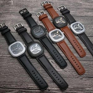 Collection of punk square dial quartz watches with leather straps on a dark wood background