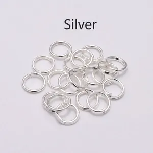 Macro shot of silver metal jump rings for DIY jewelry making and connecting accessories