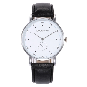 Close-up of minimalist white dial watch with black leather strap and small second sub-dial