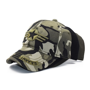 Detailed close-up of U.S. ARMY embroidery and star badge on camouflage baseball cap