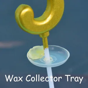 Golden number candle with anti-drip wax protector and white stem on blue background