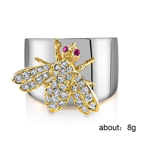 Zweifarbiger Bienenring aus Silber und Gold mit Zirkonia und roten Edelsteinaugen, 8g