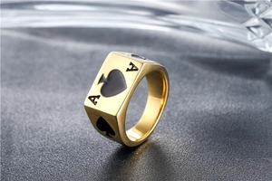 Macro view of gold stainless steel signet ring with Ace of Spades poker engraving