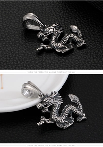 Detailed view of an intricate silver dragon pendant with realistic scales and punk style
