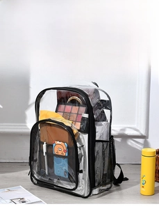 Detailed internal view of transparent PVC backpack showing large storage capacity