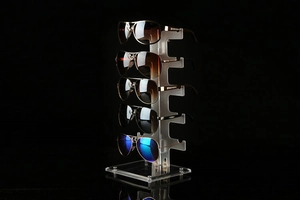 Detailed view of a 5-tier clear acrylic vertical stand for sunglasses display