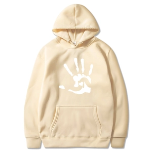 Detailed view of the ribbed cuff and beige fleece texture on the palm print hoodie